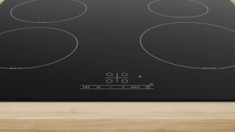 Индукционная варочная поверхность Bosch PUE61RBB6E черный от магазина РЭССИ
