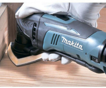 Многофункциональный инструмент Makita DTM50Z синий от магазина РЭССИ